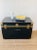 Vintage 1950s Storage Trunk black in color brass / gold metal hardware marked genuine vulcanized trunk fibre binding made...