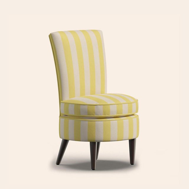 This beautiful occasional chair is offered in many different fabrics within our collections. It has a softly rounded back...
