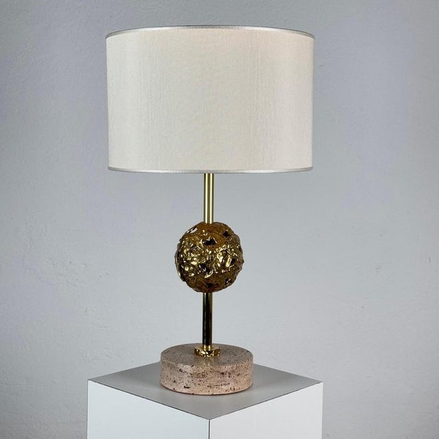 This exceptional table lamp was designed by angelo brotto for esperia and represents a refined synthesis of sculpture,...
