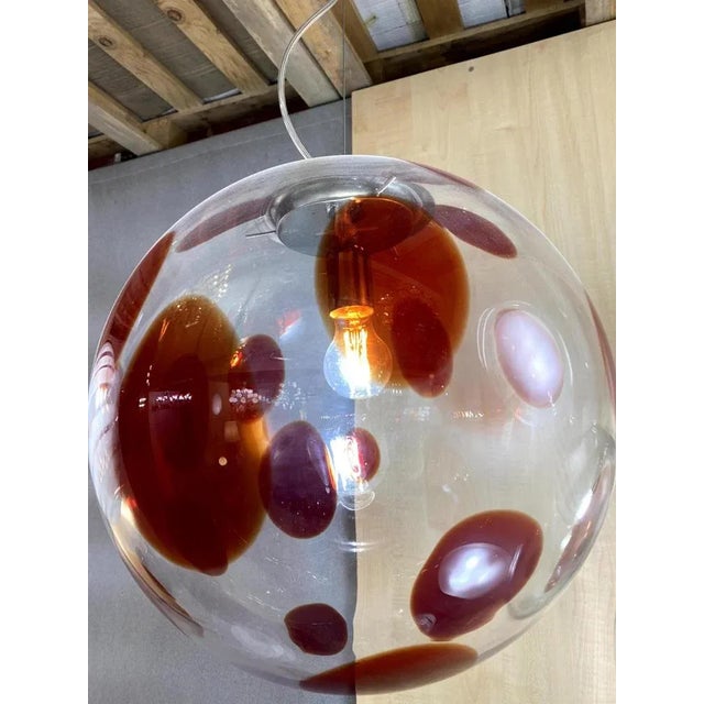 Impressive contemporary Red and transparent Sphere in Murano Glass Swirl Venini style Design in very particular and...