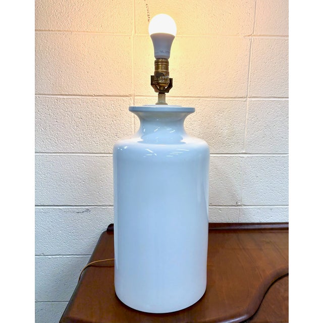 This is a stunning pair of large and stylish vintage white ceramic jar, bucket, or urn lamps. A very clean design that can...