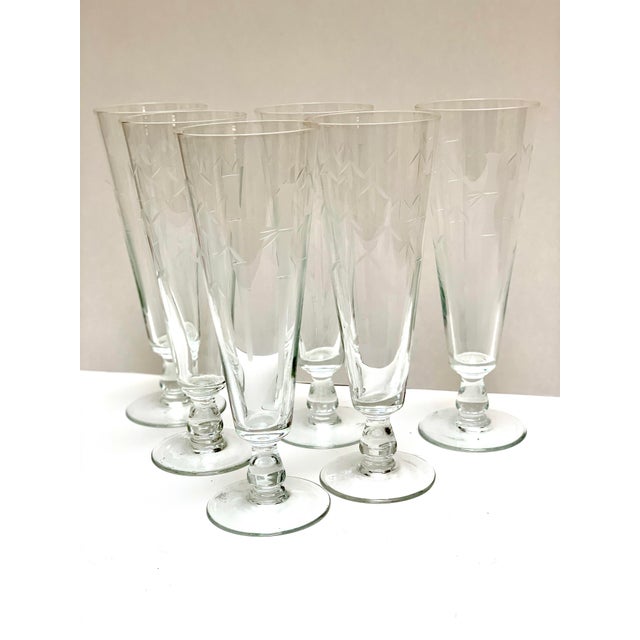 Elegant bamboo and leaf etched design set of six stemware. Perfect as champagne flutes, beer or iced tea.