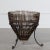 Rattan fish basket framed with iron tripod form base. Designed in Italy by Franco Albini for Raymor. Wonderful vintage...