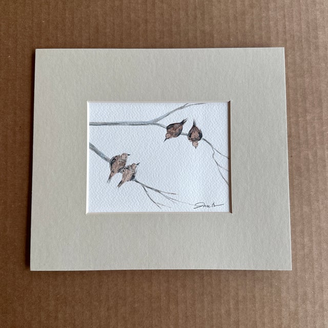 Capture the quiet beauty of nature with this original watercolor painting. Delicate strokes bring to life a cluster of...