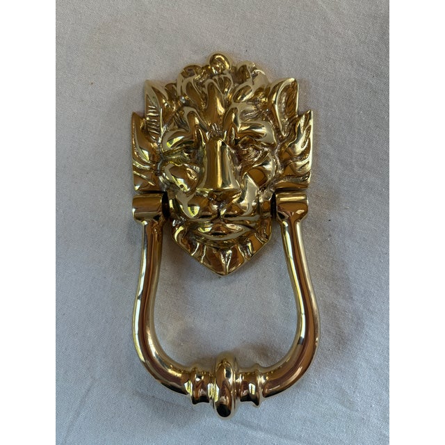 Oversized solid brass lion head door knocker in the classic Georgian style. Deep-relief mane detailing with high-polish...