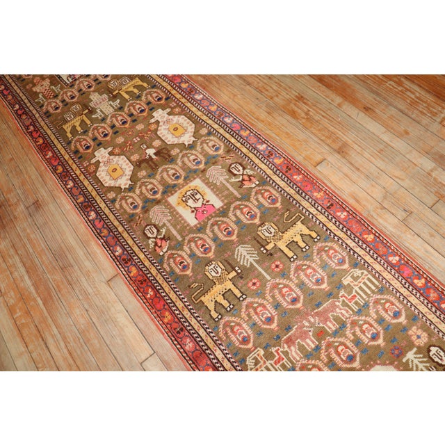 An early 20th Century Northwest Persian Conversational Animal Pictorial Runner. Details rug no. j2802 size 2' 7" x 12' 5"...