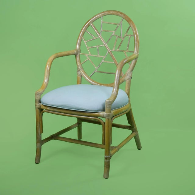 Set of 4 Ice Crackled Rattan Dining Chairs in nice as-found vintage condition. These chairs feature a beautiful crackled...