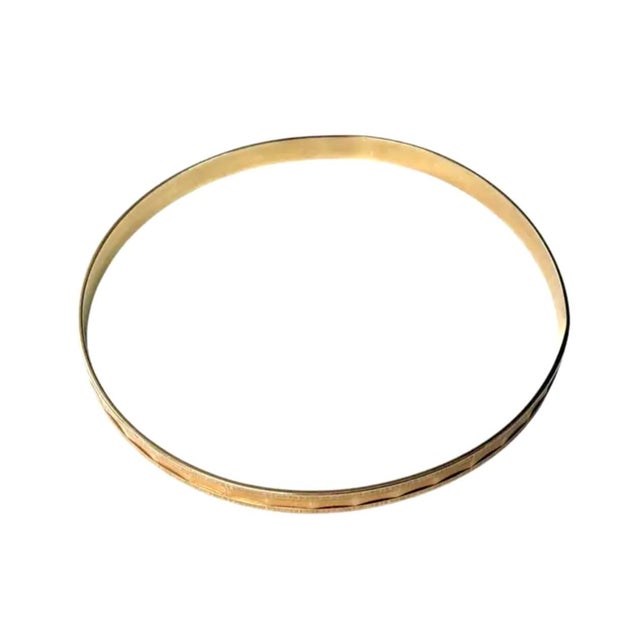 14K Yellow Gold Vintage Bangle Bracelet. Bracelet is elegant in its simplicity and embodies the timeless appeal of...