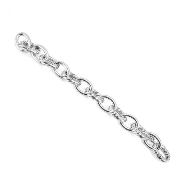Brand: David Yurman Gender: Ladies Metal Type: 925 Silver Length: 8.00 inches Width: 17.00 mm tapering to 15.00 mm Weight:...