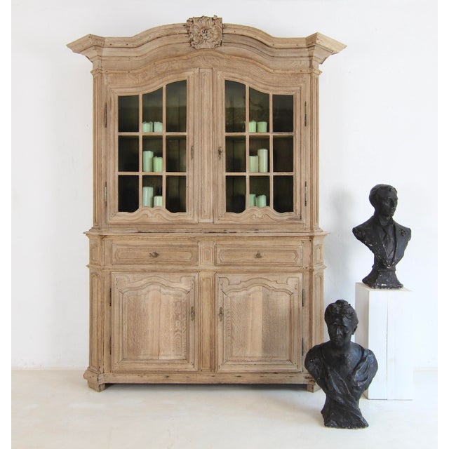 An exceptional provincial Buffet à deux corps cabinet from Belgium, dating from the late 18th century. Crafted from solid...