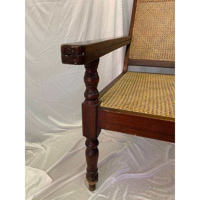 The planter’s chair or plantation chair was an 18th Century English design for both lounging and staying cool in the...