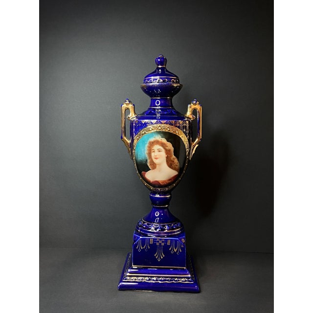 Elegant antique porcelain vase by Josef Strnact, produced in Bohemia at the turn of the 20th century. Executed in deep...