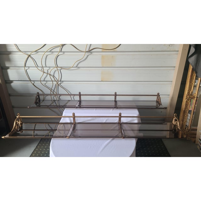 Pair of cast iron and steel shelves from a late 19th-century railroad car (see photo) converted into shelves for a kitchen...