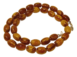 Ladies Barrel Shape Baltic Amber Necklace Hand-Knotted 14k White Gold Clasp Highly Polished.
