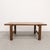 Solid teak coffee table in the style by Danish designer Niels Bach. The generously proportioned rectangular top is...