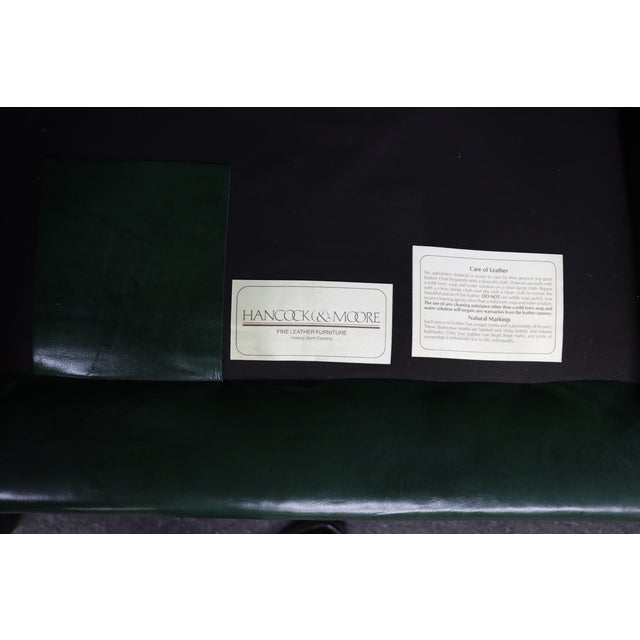 Beautifully crafted wingback chair and ottoman by Hancock & Moore, the highly regarded American maker known for its hand-...