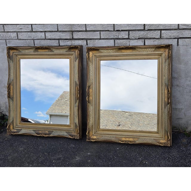 his pair of Hollywood regency mirrors is a set of two hand-painted and gilded rectangular wall mirrors that exude elegance...