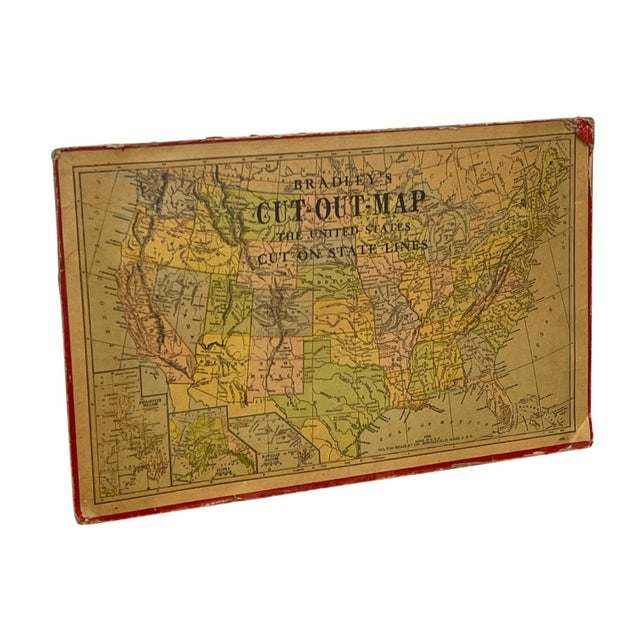 EVintage Milton Bradley's "Cut-Out Map of the United States," featuring individually outlined states arranged to form a...