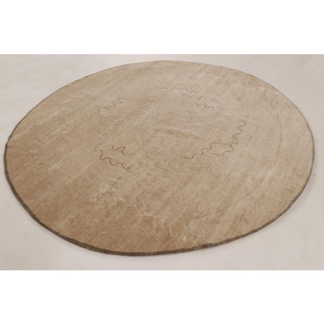 Hand-knotted in premium wool, this 8x8 round rug is a serene new addition to Rug & Kilim’s Modern collection. This...