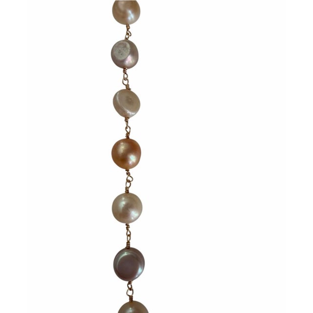 Classic multi-color baroque pearl necklace offering timeless elegance. Lightweight design for comfortable all-day wear....