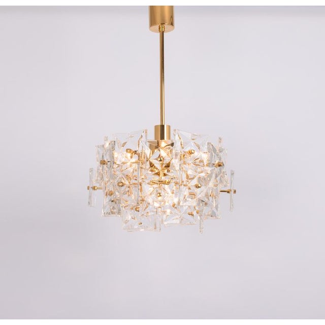 A stunning four-tier chandelier by kinkeldey, germany, manufactured in circa 1970-1979. A handmade and high quality piece....