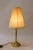 Historistic table lamp with fabric shade vienna around 1890s Brass polished and stove enameled The fabric shade is...