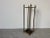 Charming vintage umbrella stand crafted from solid brass with classic finial-topped posts and elegant linear form. This...