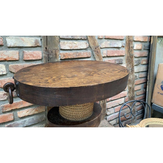 Oval Mid-Century wood & rope gueridon Audoux Minet, Circa 1960. Coffee table. Height / 19 inches. Diameter / 23 inches by...
