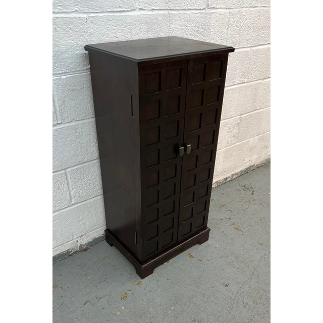 Organize your jewelry and accessories in style with this elegant tall jewelry armoire. Designed with a slim profile and...