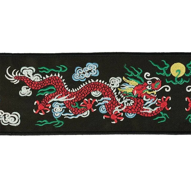 Exotic, highly stylized dragons march across this elevating accessory, which has a satin-like sheen for an extra dose of...