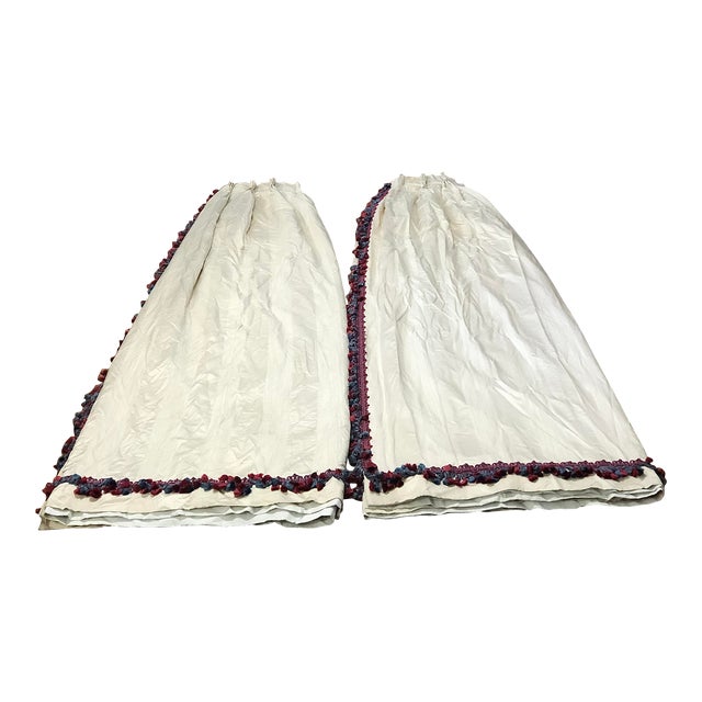 Pair of Custom French Pleat Ivory Drapes With Blue and Pinkish Red Samuel & Sons Trim For Sale