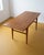 Vintage Danish teak and oak coffee table from the 1950s. Dimensions: Width: 130 cm Depth: 52 cm Height: 53 cm Design and...