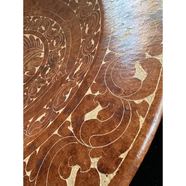 A large and beautifully executed burnished terracotta bowl from Lombok, attributed to Sasak artisans known for their...