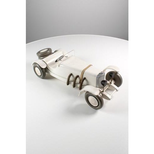 Michel aroutcheff mercedes sskk 1931 for vilac. This rare wooden model is made in france and is an example of true...