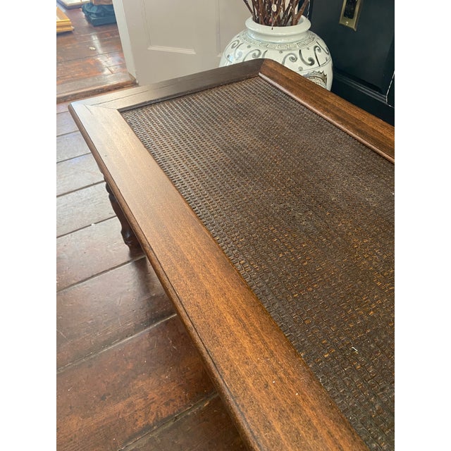 Dark wood and cane coffee table, originally purchased from Aattic in Portland, Maine. 48" W x 18" D x 16" H