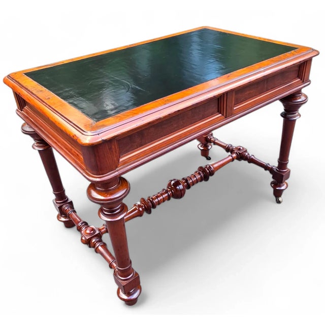 This 19th-Century Victorian Library Table Desk is a timeless piece with gentlemanly charm and character of the era....