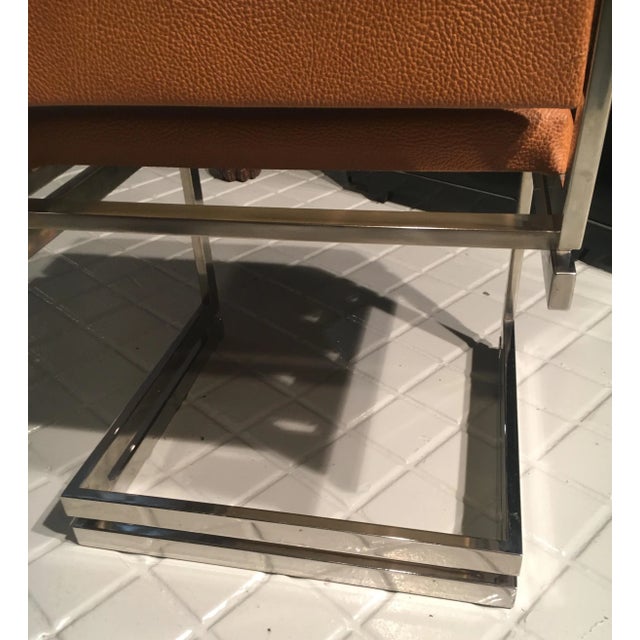 This set of six Italian dining chairs and manufactured in the 1970s. They are made from chromed steel and faux leather....