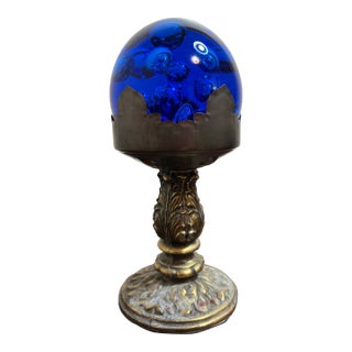 Murano Style Arctic Blue Paper Weight Housed in a Mid-Century Hollywood Regency Candle Holder For Sale