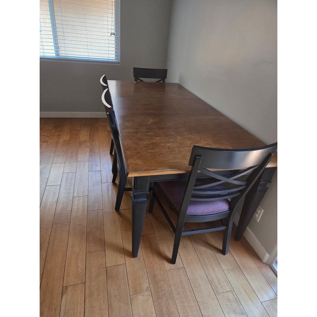 Great condition Ethan Allen dining set, table with 4 chairs and a 20" extended leaf. Photos show with removable leaf in.