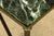 A refined mid-20th century French Maison Jansen style brass and green marble coffee table, sourced in Provence, France....