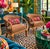 Pair of Maitland-Smith Hollywood Regency armchairs featuring sculptural wooden faux-bamboo frames complemented by...