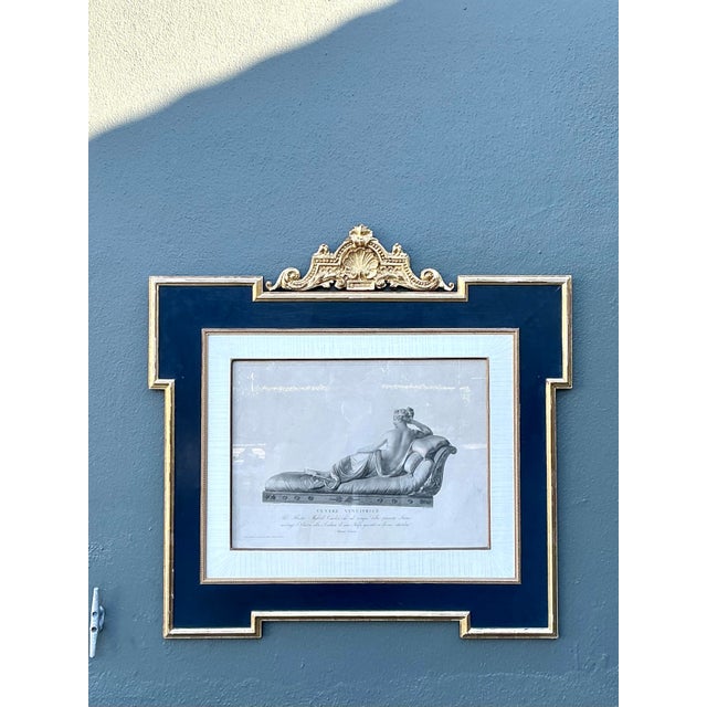 This monumental framed print is a stunning homage to Antonio Canova’s Neoclassical masterpiece, "Venus Victrix," depicting...