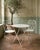 Charming and practical early 20th-century French folding metal round garden table. Featuring a beautifully patinated iron...