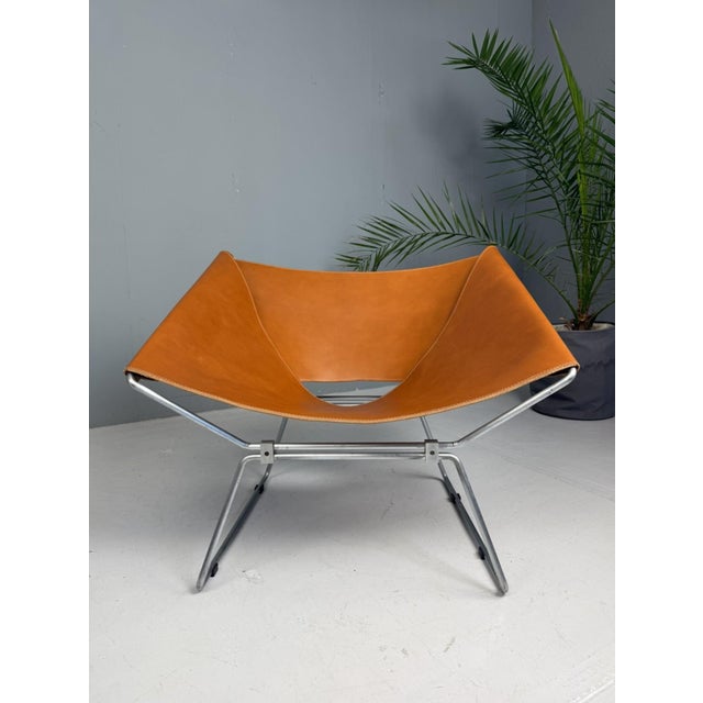 Stunning and rare AP-14 “Anneau” chair, designed by French designer Pierre Paulin in the 1950s and produced by AP Polak....