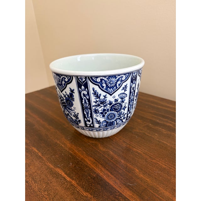 A beautiful Delft Chinoiserie style blue and white porcelain vase, planter, or chahepot By Royal Boch Mid-20th Century...