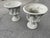 An impressive pair of large classical Bacchus garden urns, hand-cast in Great Britain in reconstituted stone and finished...