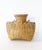 Intricately woven split-bamboo and rattan "alat" basket, crafted as a fish creel. This lovely piece includes the original...