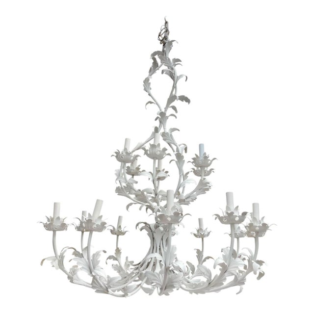 A monumental Italian 18 arm Italian chandelier distinguished by its dramatic scale & sculptural presence.The sweeping arms...