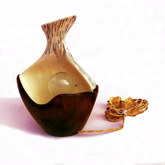 Marcello Fantoni at Cantagalli, table lamp partially covered in leather. This piece has an attribution mark, I am sure...