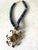 Stunning lapis beaded necklace with brass and Tiger’s eye pendant.